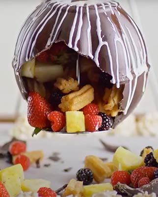 Chocolate Pinata hanging with fresh fruit